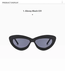 Detail view of stylish bright black C01 cat-eye sunglasses with dark gray lenses