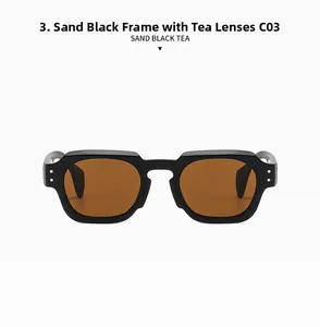 Detail of sand black matte square sunglasses with tea-colored lenses and metal studs