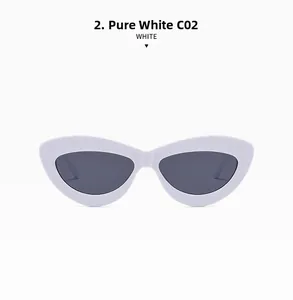 Detail view of solid white retro cat-eye sunglasses with dark grey lenses and smooth frame