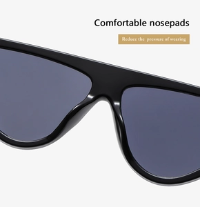 Close-up of comfortable integrated nose pads on black cat-eye sunglasses for women