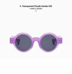 Detail of transparent purple round sunglasses with smoke lenses and metal rivet accents