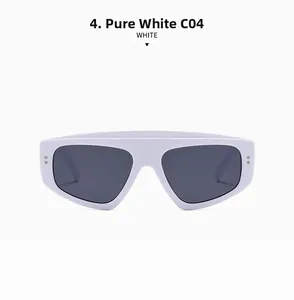 Detail view of white cat-eye sunglasses with silver stud accents and dark lenses