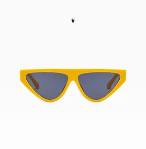 Front view of trendy yellow cat-eye sunglasses with sharp triangular frames and dark lenses