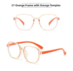 Detail view of square oversized blue light glasses in vibrant orange C7 finish