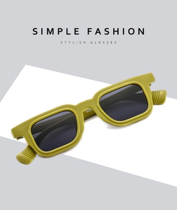Detail view of olive green rectangle sunglasses with thick frames and temple model ZN373