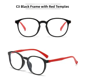 Détail des lunettes anti-lumière bleue pour enfants, monture noire et branches rouges