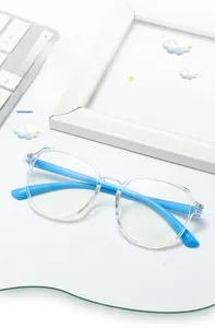 Detail of transparent frame kids anti-blue light glasses with bright blue flexible temples