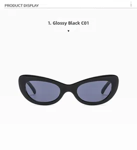 Vue détaillée de lunettes de soleil œil de chat noir brillant avec verres gris foncé
