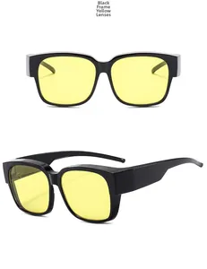 Polarized oversized sunglasses with black frame and yellow lenses from two angles