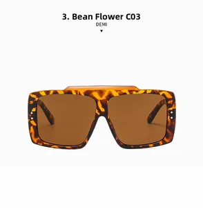 Macro detail of large square demi sunglasses featuring high-quality UV lenses and sturdy hinges