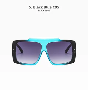 Close-up of black and blue square sunglasses frame with silver rivet details