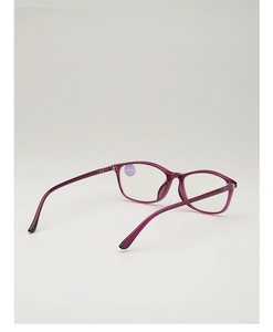 Detail of purple transparent reading glasses with anti-blue light lens and metal hinge