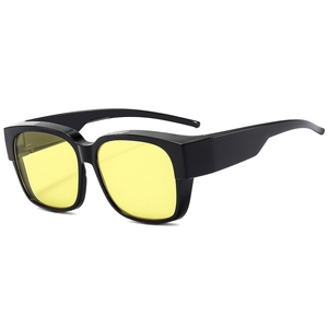 Polarized oversized sunglasses with yellow night vision lenses and glossy black frame