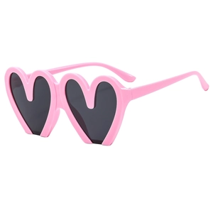Trendy heart-shaped sunglasses with pink double frames and black lenses for parties