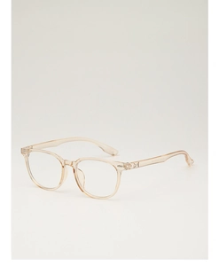 Detail view of champagne transparent eyeglass frames showing size 51-20-143 on temple