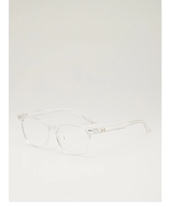 Detailed view of transparent square frames with fine gold metal accents on the hinges