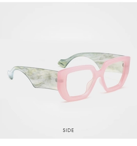 Side view of retro hexagonal glasses with pink transparent frame and marble temples