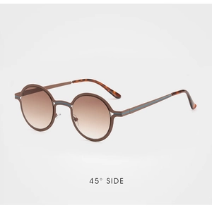Detailed 45-degree side view of vintage round two-tone metal sunglasses with brown lenses