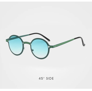 Detail view of round dual-tone metal sunglasses with dark green frames and neon green accents
