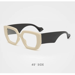 Detail view of stylish oversized glasses frames with two-tone cream and black color design