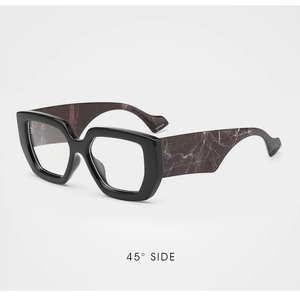 45-degree side view showing black oversized frames and marbled temple details