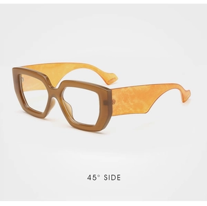 Detailed 45-degree side view of oversized retro frames with wide translucent yellow temples