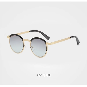Macro 45-degree view of round metal sunglasses with gradient lenses and dual-tone frame