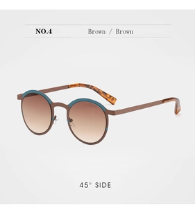 Close-up 45-degree side view of vintage round sunglasses with brown gradient lenses