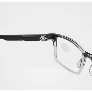 Close-up of the spring hinge detail and blue light blocking lens on +1.00 reading glasses