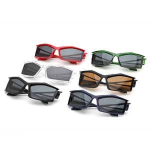 Top view of futuristic geometric sunglasses in six vibrant colors on white background