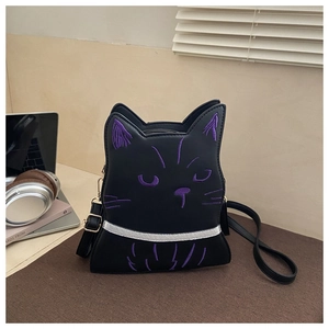 Detail of black cat cross-body bag with purple embroidery and reflective silver strip