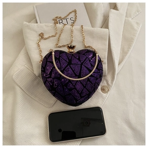 Detailed top view of purple heart sequin evening bag showing smartphone capacity and chain