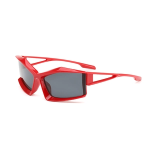 Futuristic red polygon sunglasses with triangular cut-outs and dark UV lenses