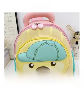 Close-up of cute cartoon bear backpack with macaron yellow and pink contrast colors