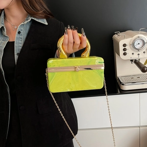 Neon green marble acrylic clutch bag with gold handle and chain strap for evening events