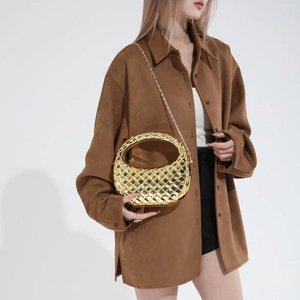 Glossy gold woven half-moon handbag with metallic grid texture and chain shoulder strap