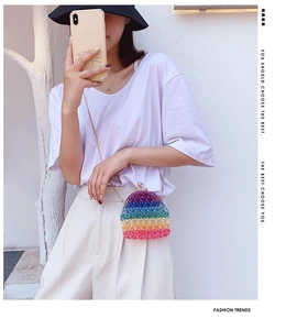 Rainbow acrylic beaded mini bag with colorful layers and gold chain strap detail