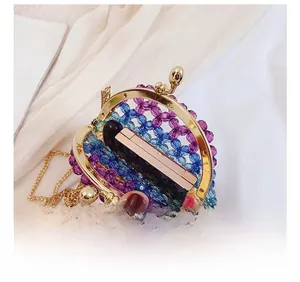 Interior view of the acrylic beaded mini bag showing space for lipstick and cosmetics