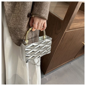 Silver geometric evening clutch bag with golden bamboo handle and metal chain strap