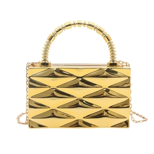 Luxurious gold acrylic box clutch with geometric 3D texture and spiral metal handle