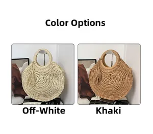 Detail view of woven straw tote bags in beige and khaki with ring handles and tassels