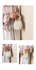 Close-up of white woven bucket bag featuring wooden ring handles and yellow bead accents