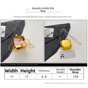 Size guide for mini geometric chain bag showing 11x11x5.5cm dimensions and capacity