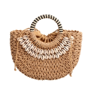 Handmade half-round straw handbag with white shell decor and striped circular handles