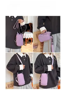 Multiple ways to wear the light purple nylon crossbody bag for phones and water bottles