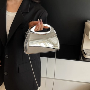 Metallic silver party clutch bag with ring handle and chain strap for evening events