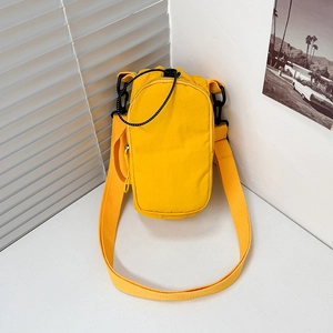 Bright yellow lightweight nylon crossbody water bottle bag with stylish drawstring closure