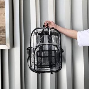 Detail view of transparent PVC waterproof backpack with reinforced black mesh pocket