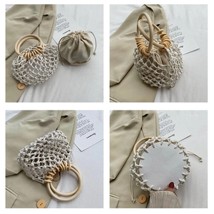 Detail of hand-woven cotton rope mesh bag with circular wooden handles and drawstring liner