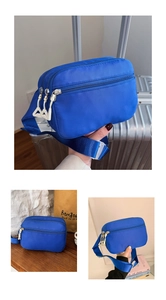 Detailansicht der blauen Kinder-Bauchtasche mit mehreren Reißverschlüssen aus Nylon